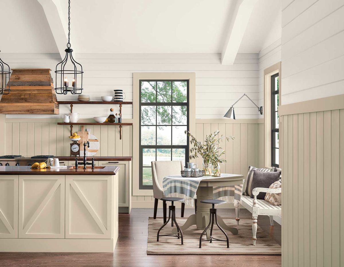 Kitchen and breakfast nook painted in Touch of Sand SW 9085.