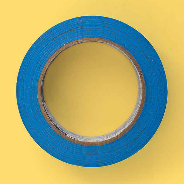 painter's blue tape on yellow background