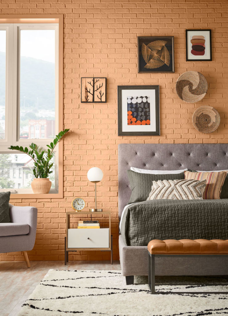 caramel brick wall with window, half of the bed