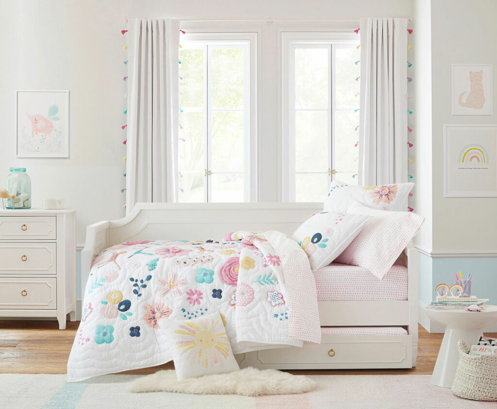 kids bedroom with pastel rainbow accents