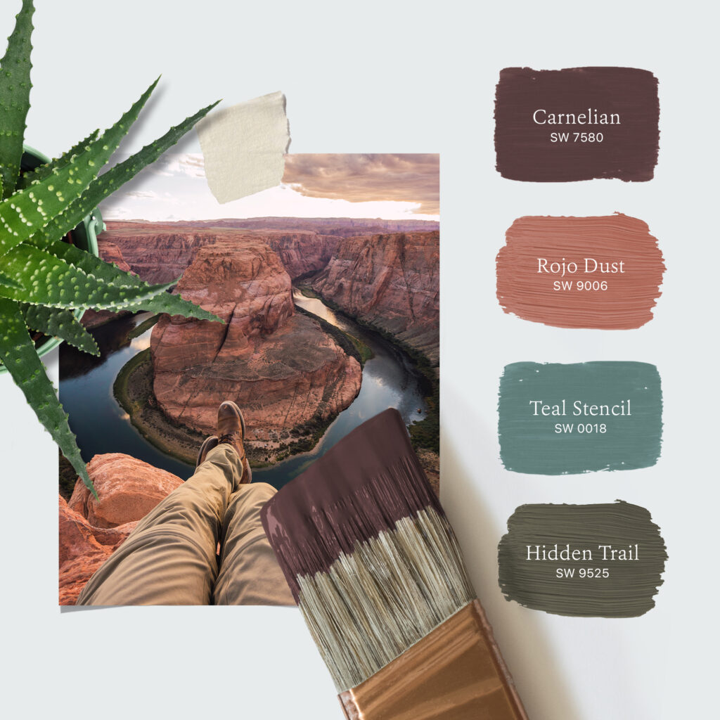 Photo of a hiker’s outstretched legs on a cliff high above Horseshoe Bend in Arizona. Laying on the photo is an aloe cactus and a paint brush dipped in brownish purple-colored paint. To the right of the photo is a stacked palette of four Sherwin-Williams paint colors including Carnelian SW 7580, Rojo Dust SW 9006, Teal Stencil SW 0018, and Hidden Trail SW 9525.