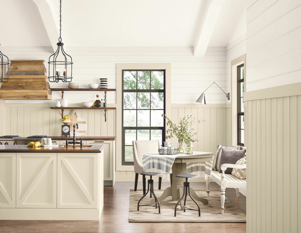 Farmhouse kitchen with wainscoting and shiplap walls.