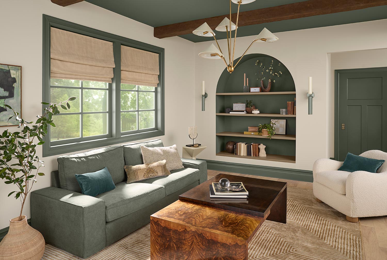 An organic modern living room with ceiling, trim, and accents painted in Rosemary SW 6817.