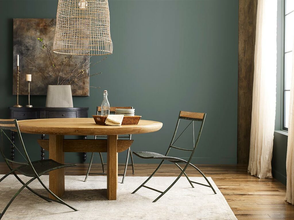 Dining room scene with wall painted in Homburg Gray.