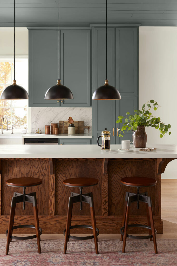 A kitchen with cabinets painted Homburg Gray SW 7622