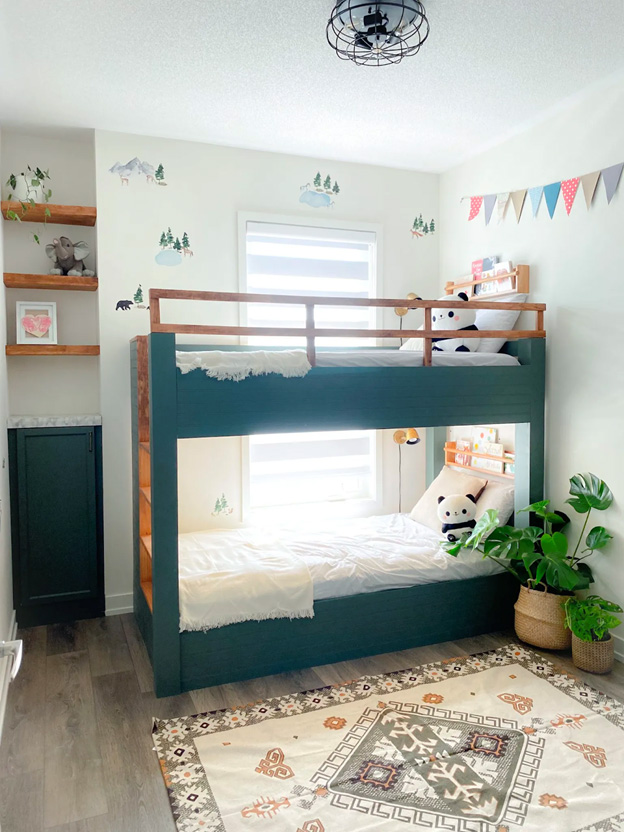 A whimsical child's bedroom with a bunkbed painted in SW 6208 Pewter Green.