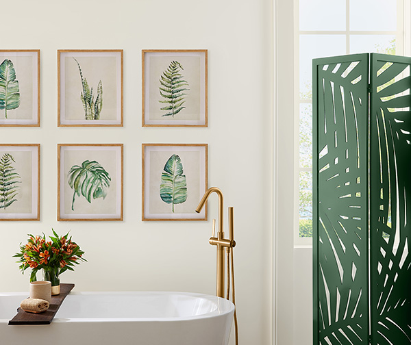 Bathroom with botanical wall art.