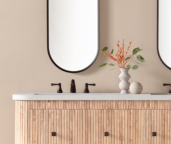 Bathroom vanity with walls painted Drift of Mist SW 9166.