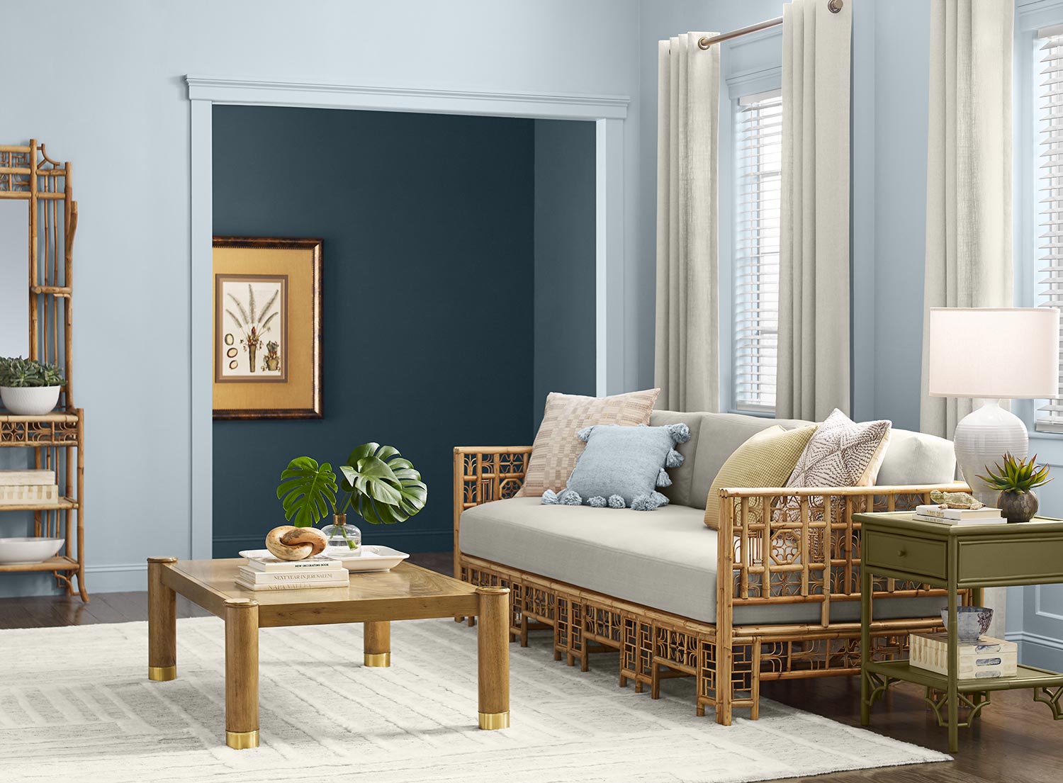 Coastal style living room with walls painted Upward SW 6239 and Gale Force SW 7605.