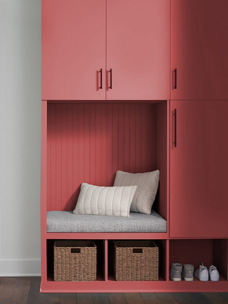 Close cropped image of a mudroom cabinet painted in Wild Poppy SW 9694.